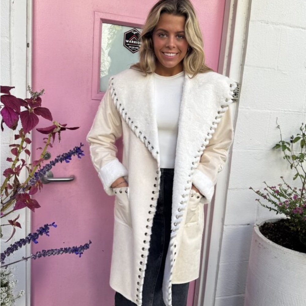 Cream Teddy Jacket with Ruffled Shoulders and Plush Texture